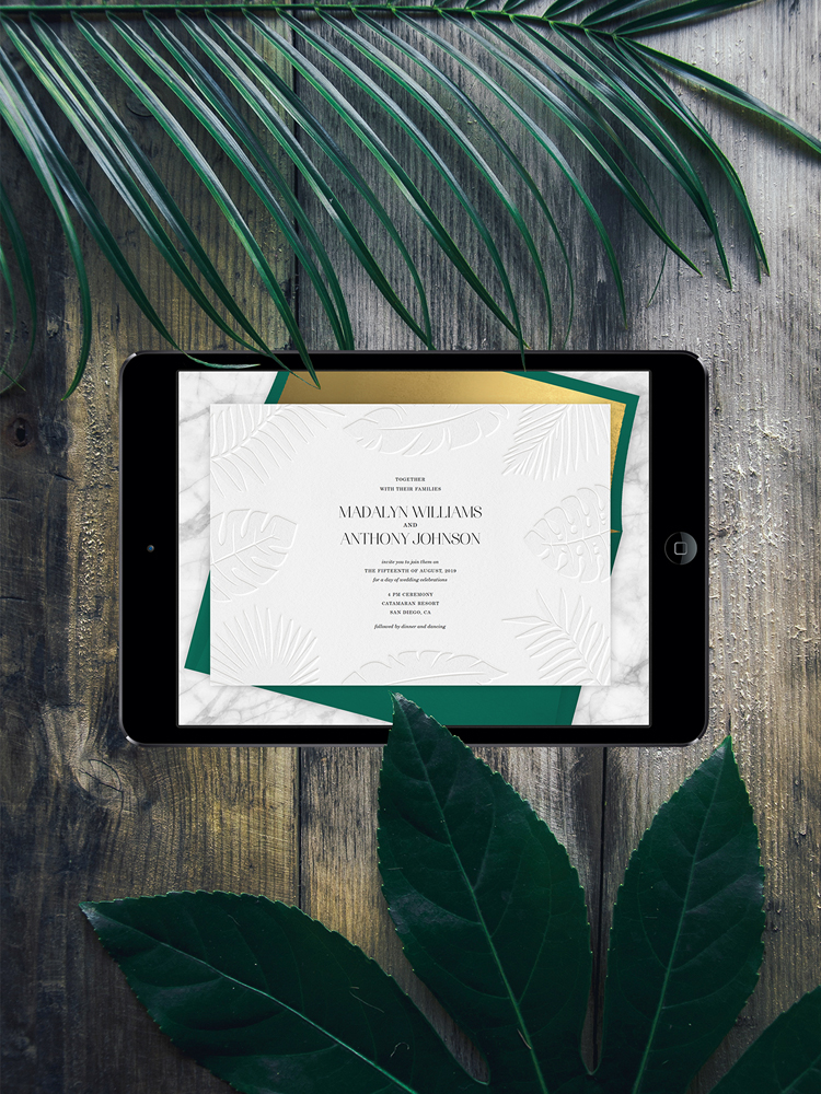 Letterpress palm leaves on this luxurious online wedding invitation