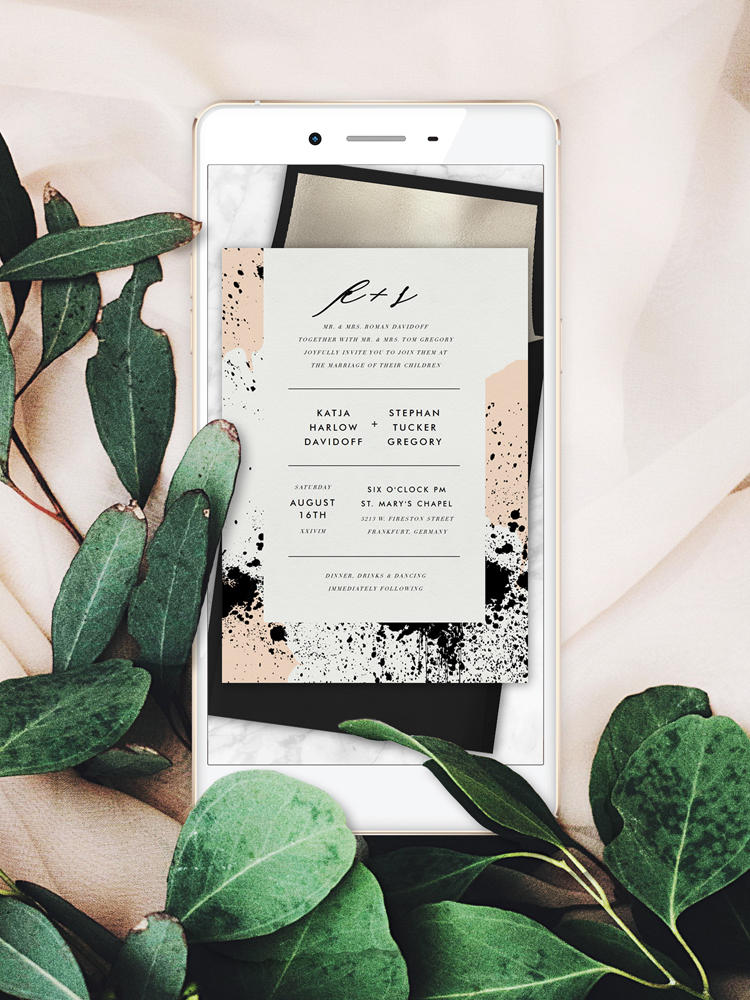 Scandinavian inspired wedding invitation with modern paint splatters and modern layout