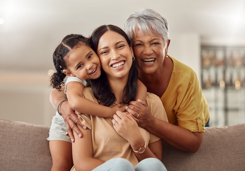 Happy mothers day blessings: 3 generations of women hugging each other