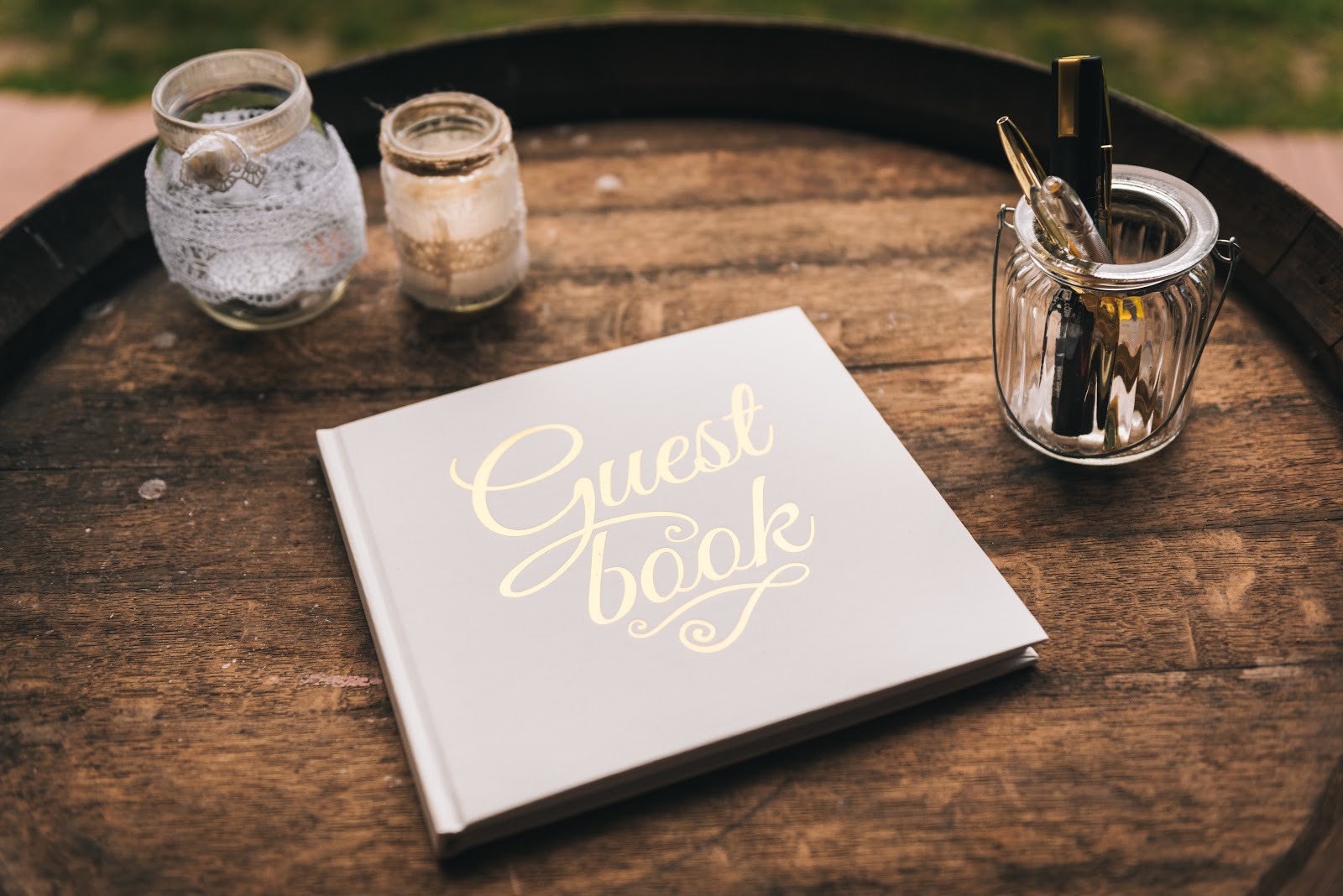 Wedding guest book ideas: a guest book on a rustic wine barrel