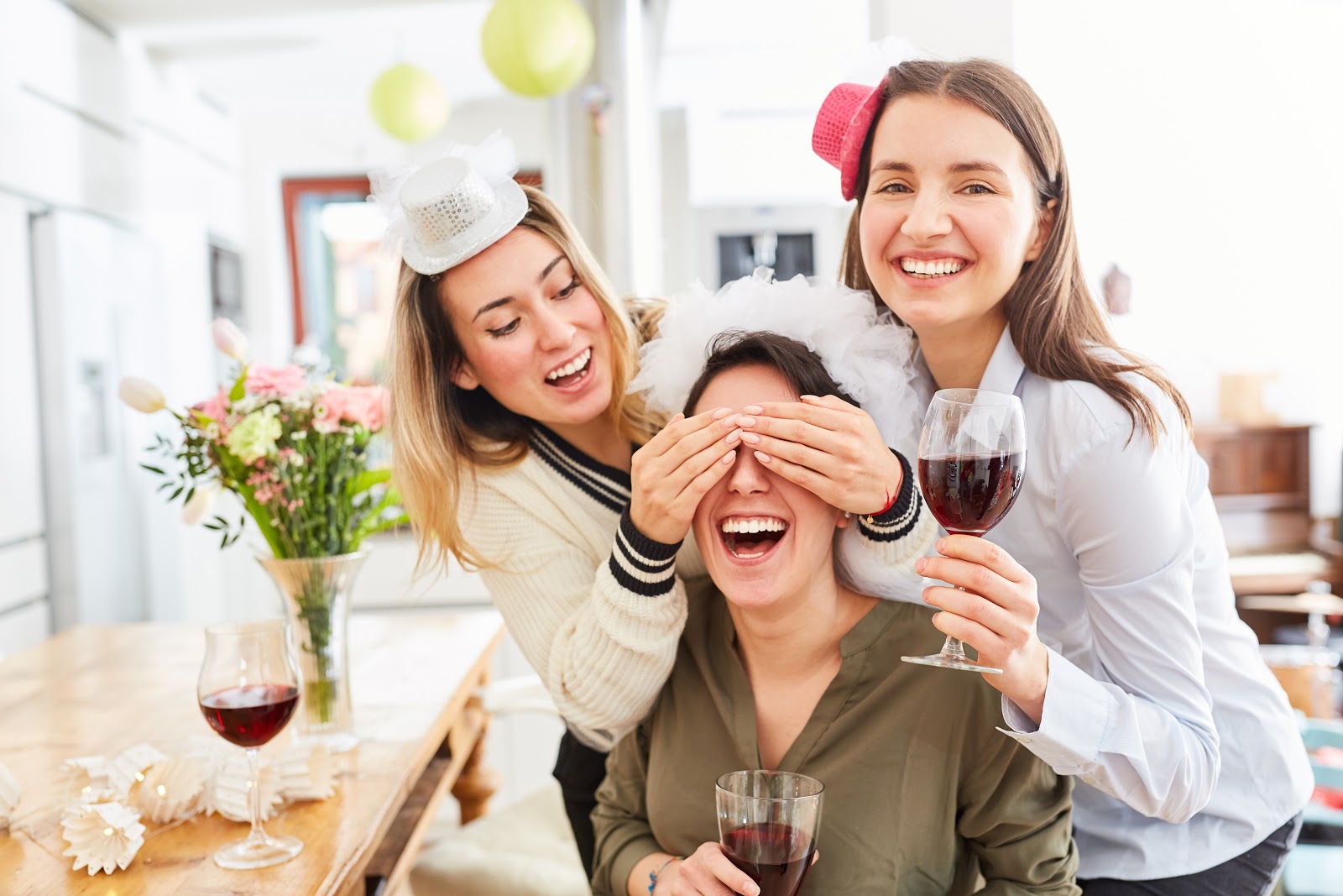 Bridal shower invitations: Bride blindfolded by her bridesmaid