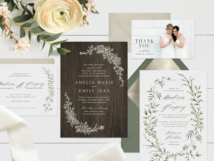 Four wedding invitation ideas on a rustic backdrop with flowers