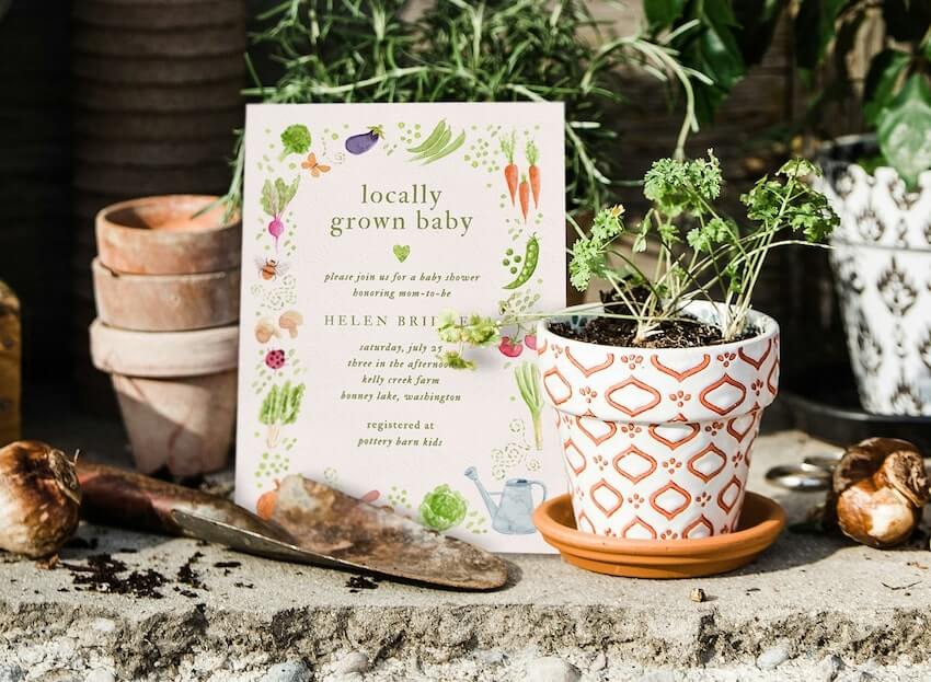 Locally grown baby shower invites: Locally Grown Invitation beside a small potted plant