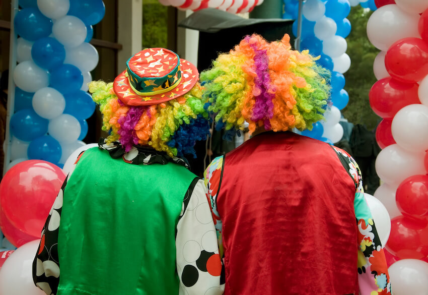 Backview of 2 clowns