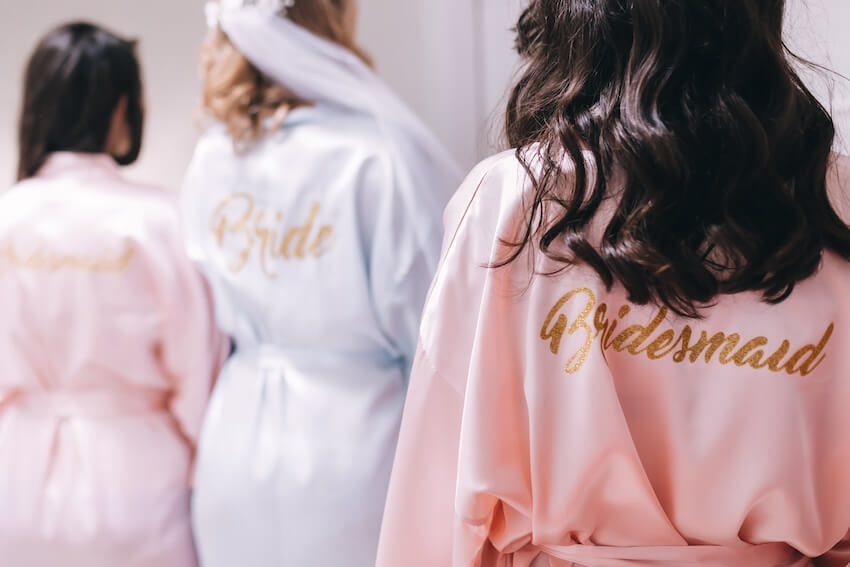 Bride and bridesmaids wearing silk robes
