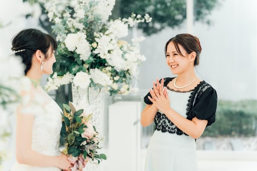 Bride smiling at her guest