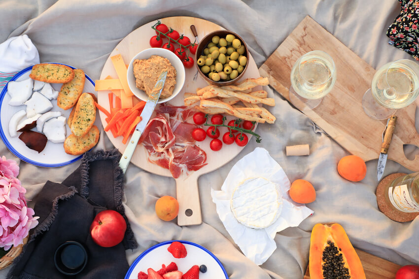 Charcuterie board and 2 glasses of wine
