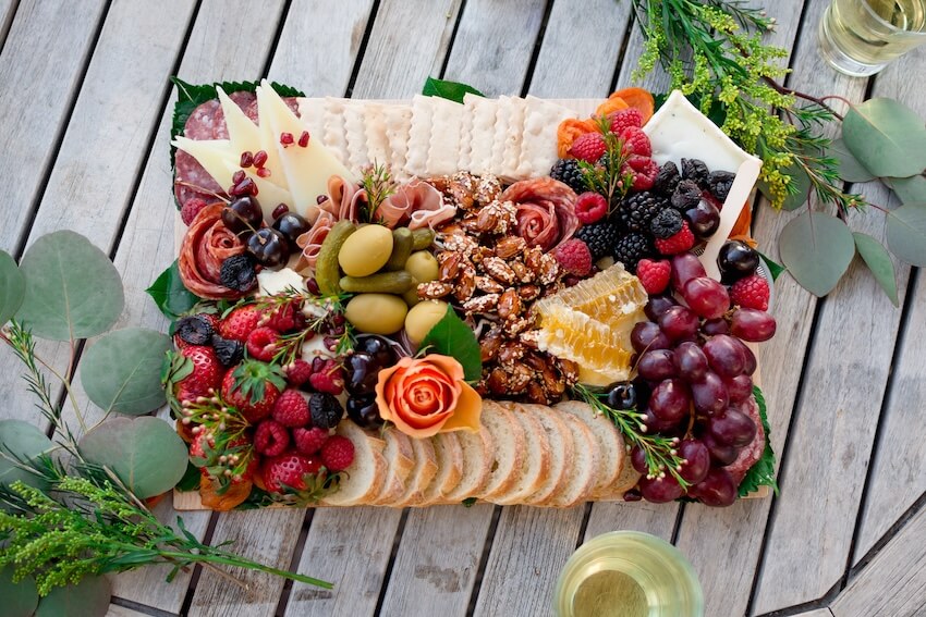 Galentine party ideas: charcuterie board on a wooden table