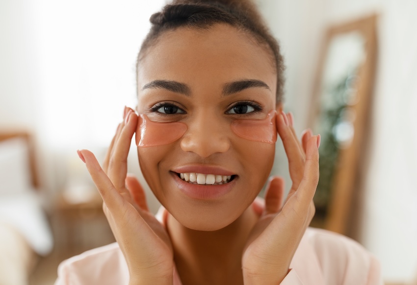 Close up of a woman wearing under eye masks