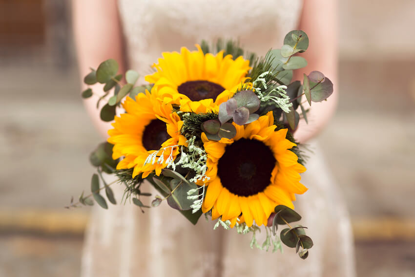 Sunflower wedding: close up shot of a sunflower bouquet