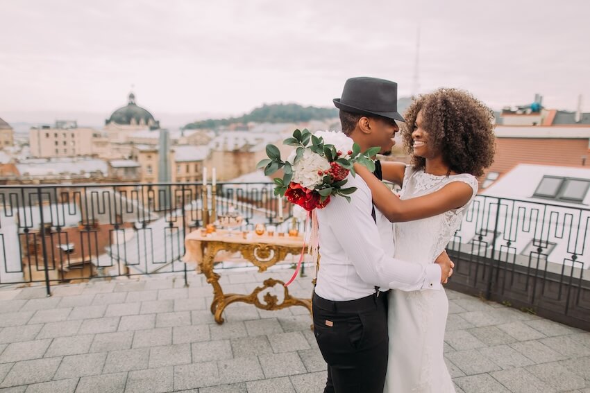 Elopement ideas: couple happily dancing