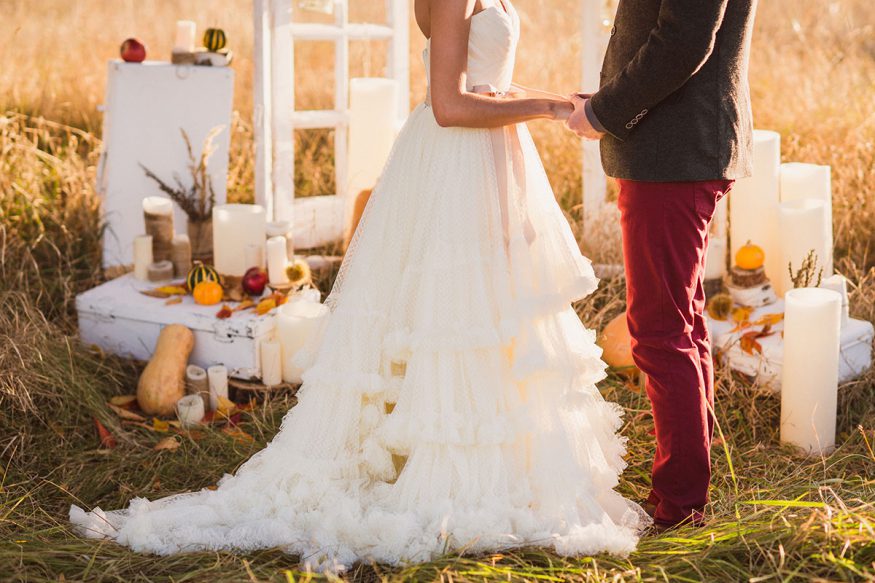 fall wedding ideas: couple in outdoor wedding setting