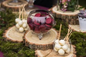 Green wedding: various desserts in glass jars