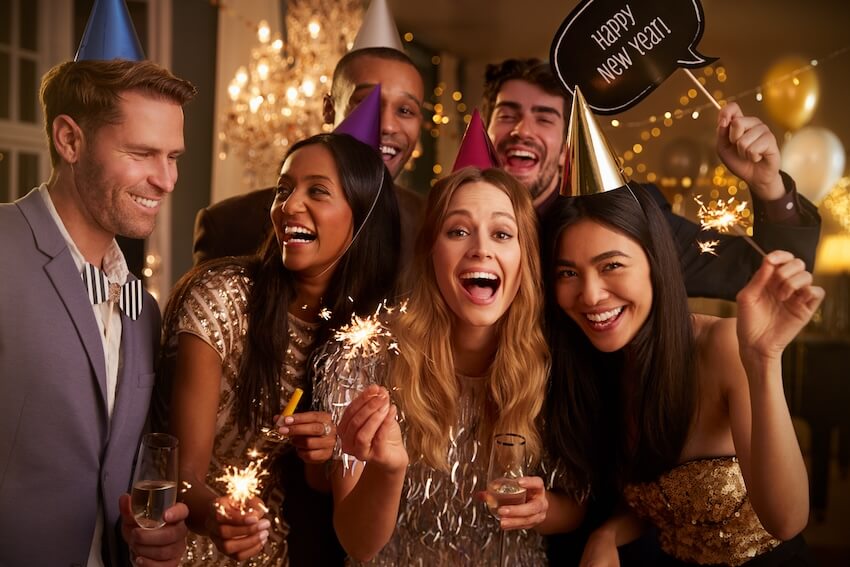 New Years Eve party themes: friends celebrating the New Year together
