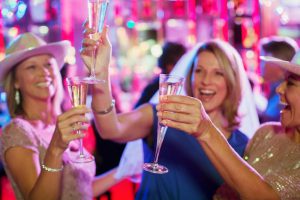 Western invitations: friends having a toast at a party