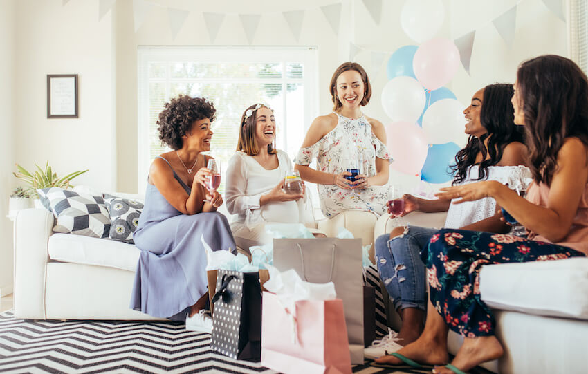 Baby shower games: friends talking to each other