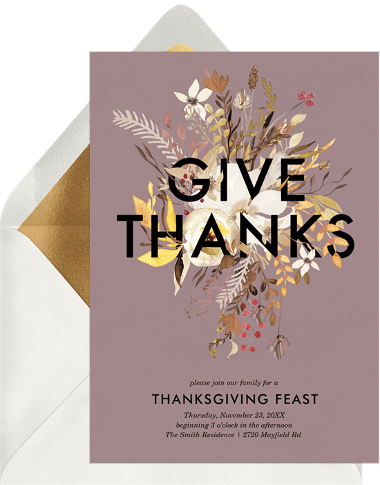 A Thanksgiving invitation with flowers emerging from "Give Thanks" text