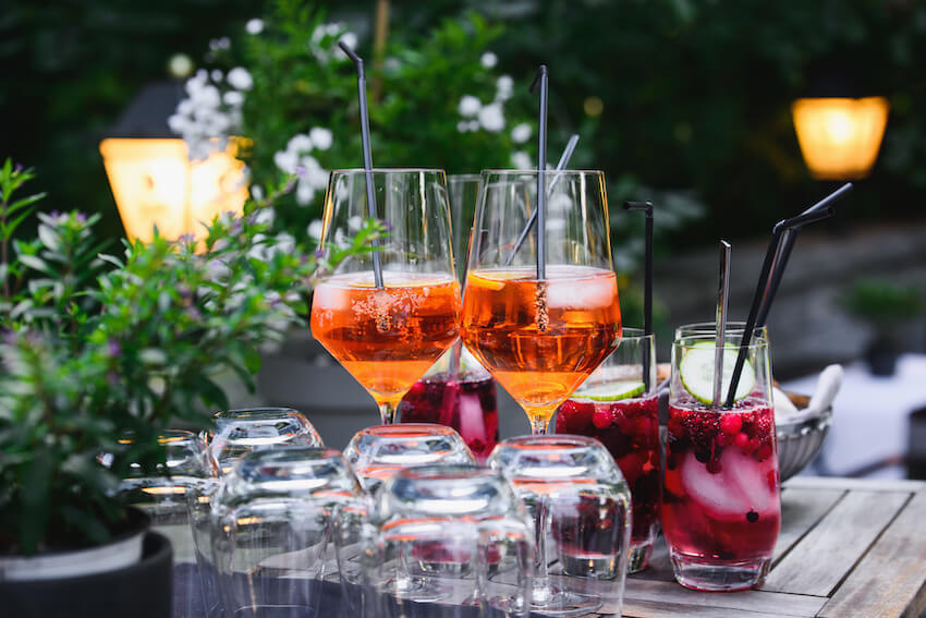 BBQ birthday party ideas for adults: glasses of cocktails on a table