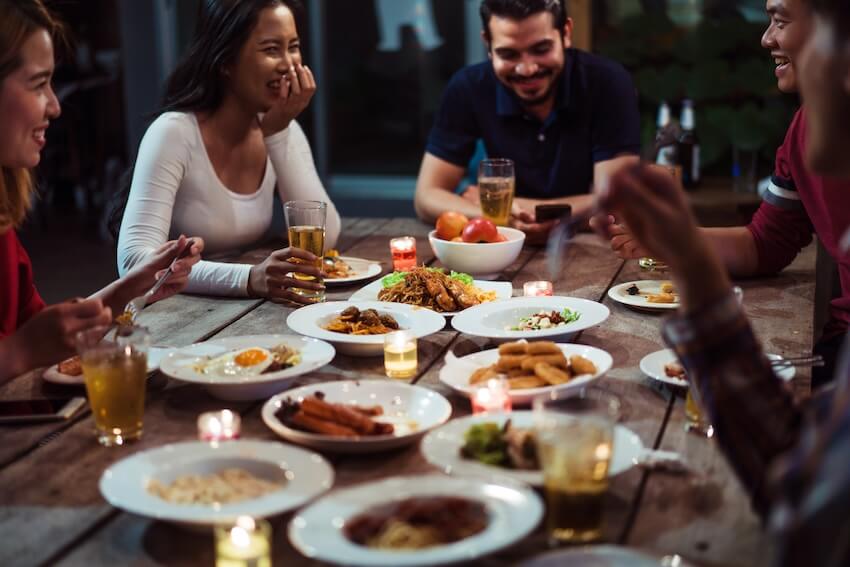 Dinner theme ideas: group of friends at a dinner party