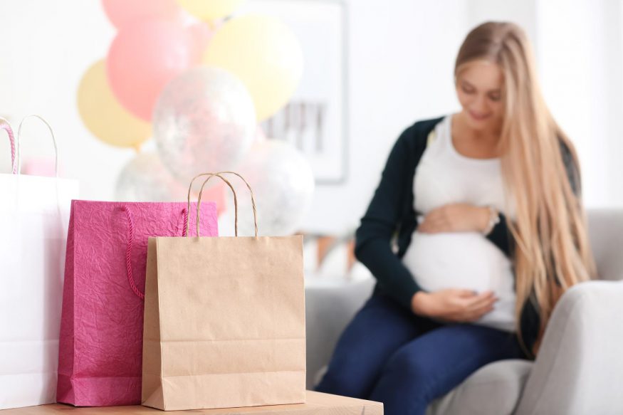 virtual baby shower ideas: Pregnant woman with gifts