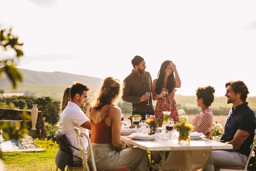 group of people having a meal outside