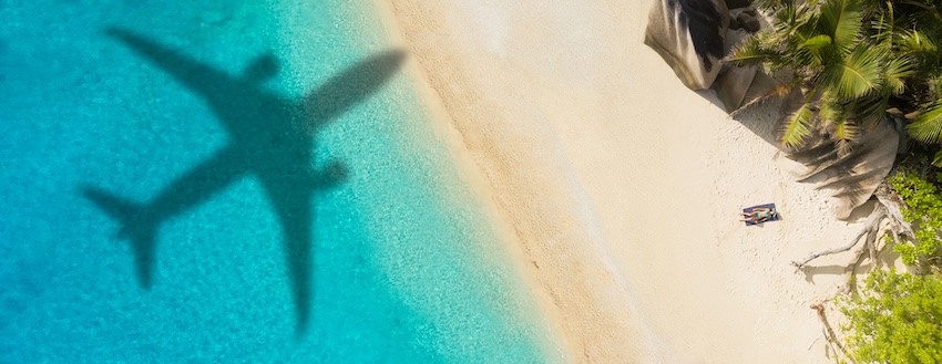 Large airplane shadow on a beach