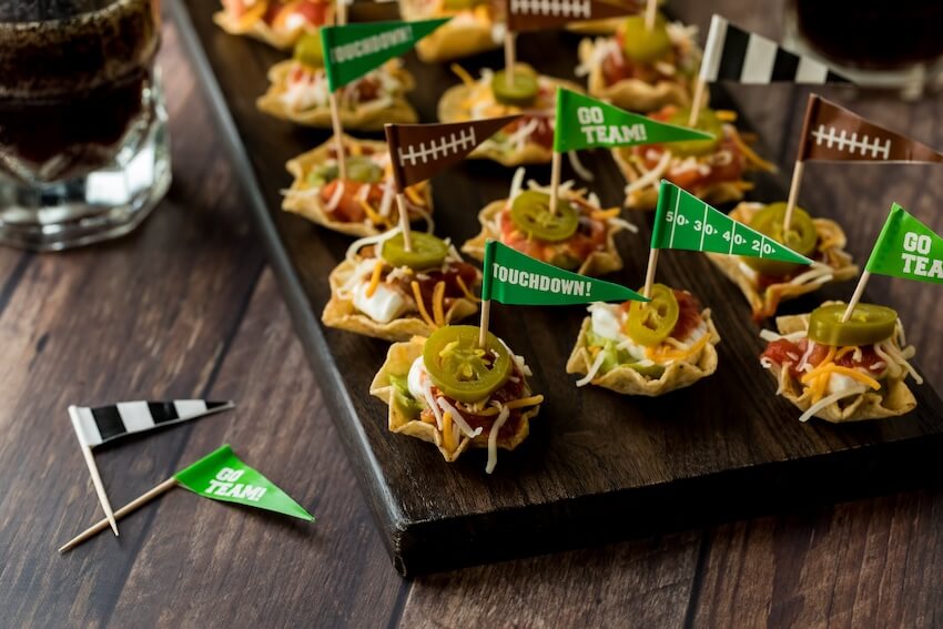 Mini tacos with football-themed flags