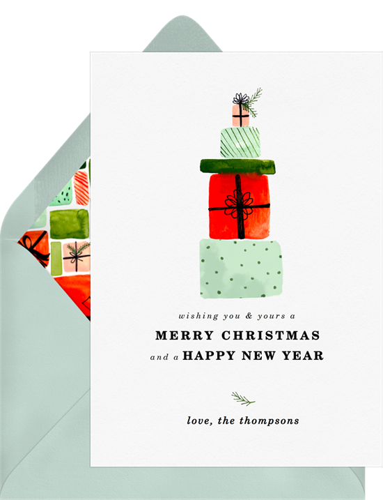 A card that reads, "wishing you & yours a merry Christmas and a happy New Year," an example of short Christmas card greetings