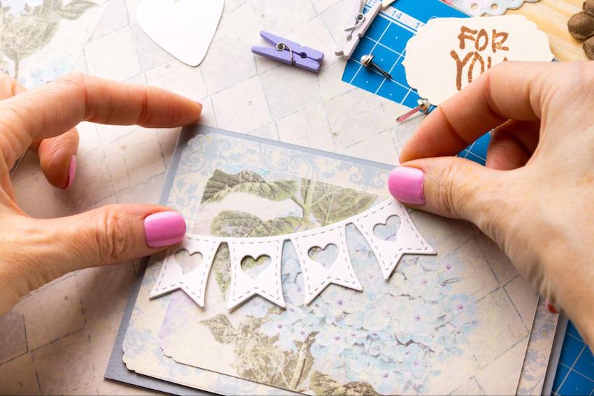 Person designing a scrapbook