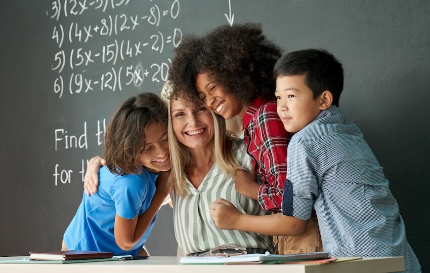 Words of gratitude for teachers: pupils hugging their teacher