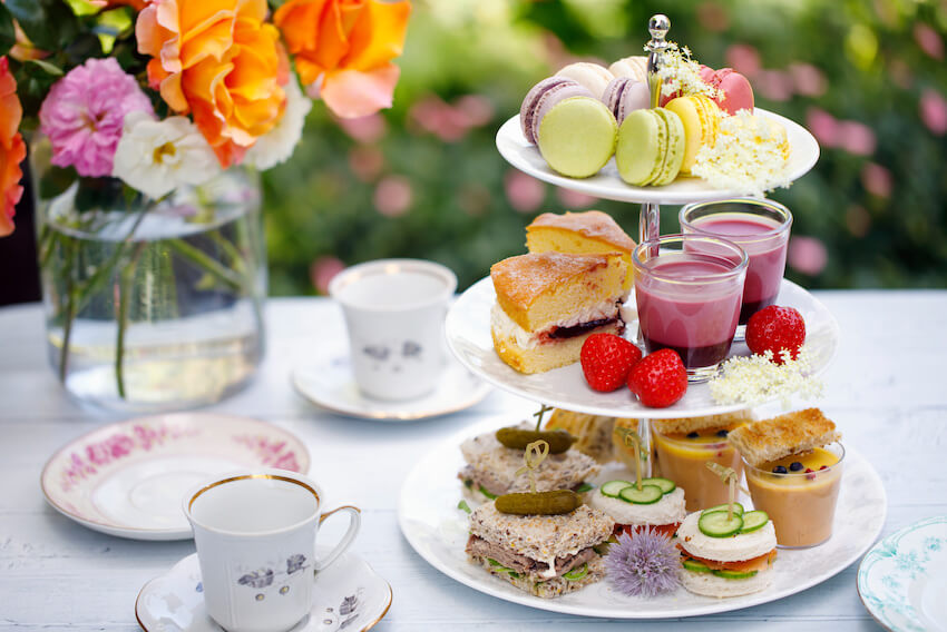 Tea party baby shower: snack stand on a table