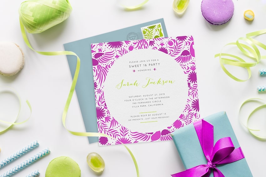 Sweet 16 invitation ideas: invitation card surrounded by ribbons, macaroons, and gifts