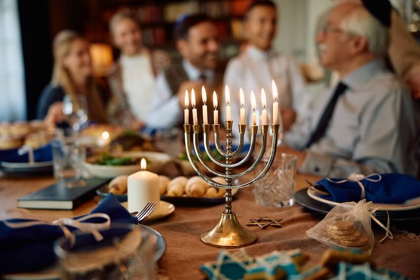 Happy Hanukkah card: table setting with a Hanukkiah
