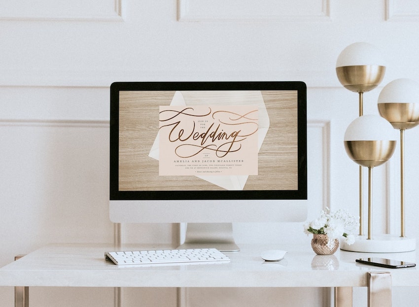 Wedding invitation card on a computer screen