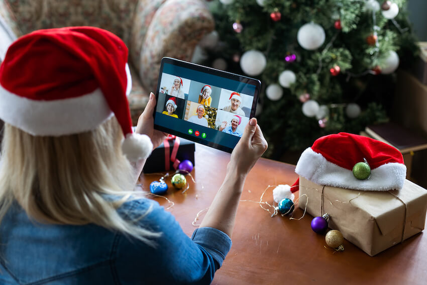 Woman having a video call with her family